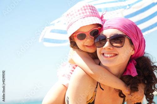 Photo: girl and her mother at the seaside girl and her mother at the seaside