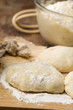 Dough on wooden board