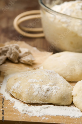Photo: Dough on wooden board Dough on wooden board