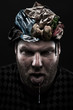 Heap of garbage inside silly man head