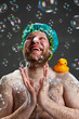 Foto: Happy man and soap bubbles Happy man and soap bubbles