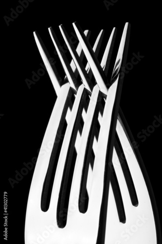 Photo: Two crossed silver forks Two crossed silver forks