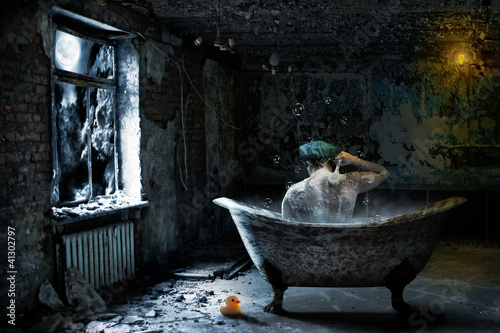 Photo: Alone man in abandoned bathroom Alone man in abandoned bathroom