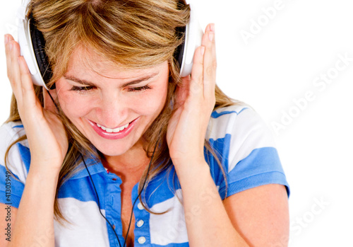 Photo: Woman listening to music Woman listening to music