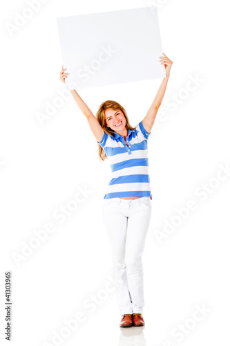 Photo: Woman holding a banner Woman holding a banner