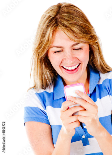 Фото: Happy woman texting Happy woman texting