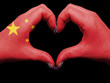 Heart and love gesture by hands colored in china flag for touris Heart and love gesture by hands colored in china flag for touris