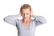 Young woman feeling a pain in ear