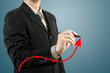 businessman hand drawing chart red arrow businessman hand drawing chart red arrow