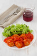 turkey meatballs with tomato paste on the plate