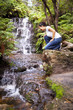 Woman at Waterfall