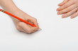 Hand with red pencil