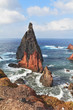 Bright red and gray cliffs east of the island