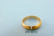 Photo: wedding ring with a crack in it ( divorce concept) wedding ring with a crack in it ( divorce concept)