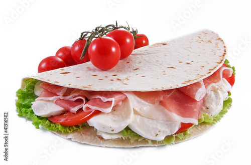 Photo: Piadina crudo mozzarella pomodorini insalata Piadina crudo mozzarella pomodorini insalata
