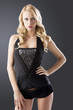 sexy blond woman with hand on the hip