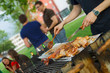 Chicken quarters and sausages on the grill. Chicken quarters and sausages on the grill.