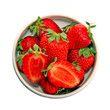 A heap of red fresh strawberries in a dish, isolated on white A heap of red fresh strawberries in a dish, isolated on white