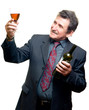 Elder businessman with glass of red wine isolated on white Elder businessman with glass of red wine isolated on white