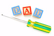 Fathers Day - wooden blocks spelling DAD with screwdriver Fathers Day - wooden blocks spelling DAD with screwdriver