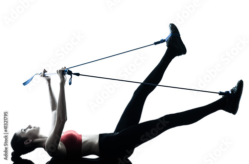 Photo: woman exercising gymstick woman exercising gymstick