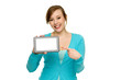 Woman pointing at digital tablet Woman pointing at digital tablet