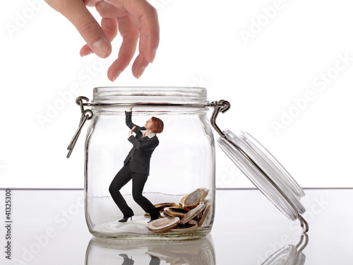 Photo: Woman protecting her savings Woman protecting her savings