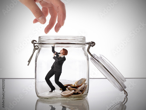 Photo: Woman protecting her savings Woman protecting her savings