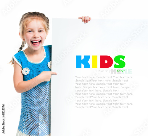 Photo: child behind a board child behind a board