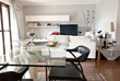 Foto: Interior decoration of a modern room, glass table and tv Interior decoration of a modern room, glass table and tv