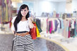 Casual beautiful woman with shopping bags