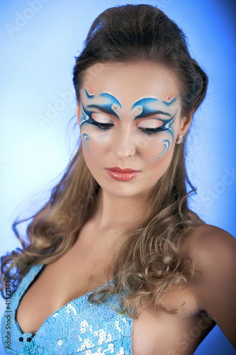 Photo: Romantic Beauty in blue with Carnival mask Romantic Beauty in blue with Carnival mask