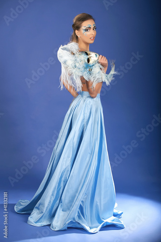 Photo: Romantic Beauty in blue, with Carnival mask Romantic Beauty in blue, with Carnival mask