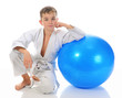 Young boy training karate. Young boy training karate.
