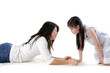 Asian mother and her daughter on white background