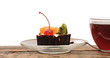 delicious cake with fruit and a cup of tea delicious cake with fruit and a cup of tea