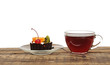 delicious cake with fruit and a cup of tea delicious cake with fruit and a cup of tea