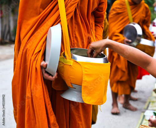 Photo: Offer food to monk on early morning Offer food to monk on early morning