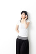 attractive asian woman listening music