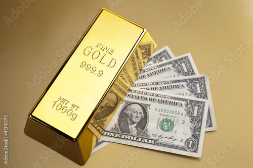 Photo: Gold and money, financial concept Gold and money, financial concept