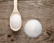 Pile of sugar on wood background