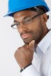 Engineer in hardhat thinking Engineer in hardhat thinking