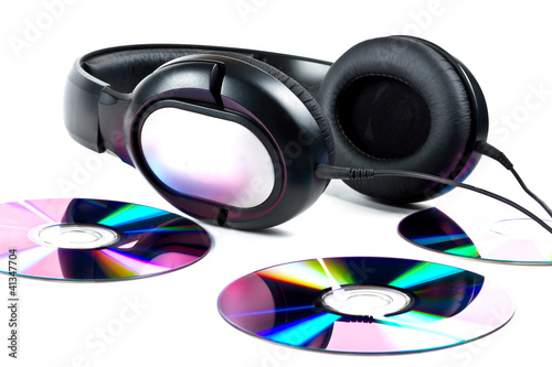 Photo: Music concept with Hi-Fi headphones and CD disc Music concept with Hi-Fi headphones and CD disc