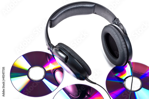 Photo: Music concept with Hi-Fi headphones and CD disc Music concept with Hi-Fi headphones and CD disc