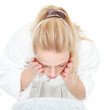 Young woman washing face