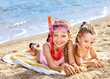 Children playing on  beach. Snorkeling.