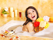 Young woman take bath.