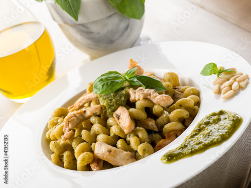 Photo: pasta with pesto sauce and chicken breast, healthy food pasta with pesto sauce and chicken breast, healthy food