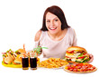 Woman eating fast food.