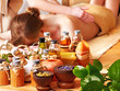 Foto: Woman getting massage in luxury spa. Woman getting massage in luxury spa.